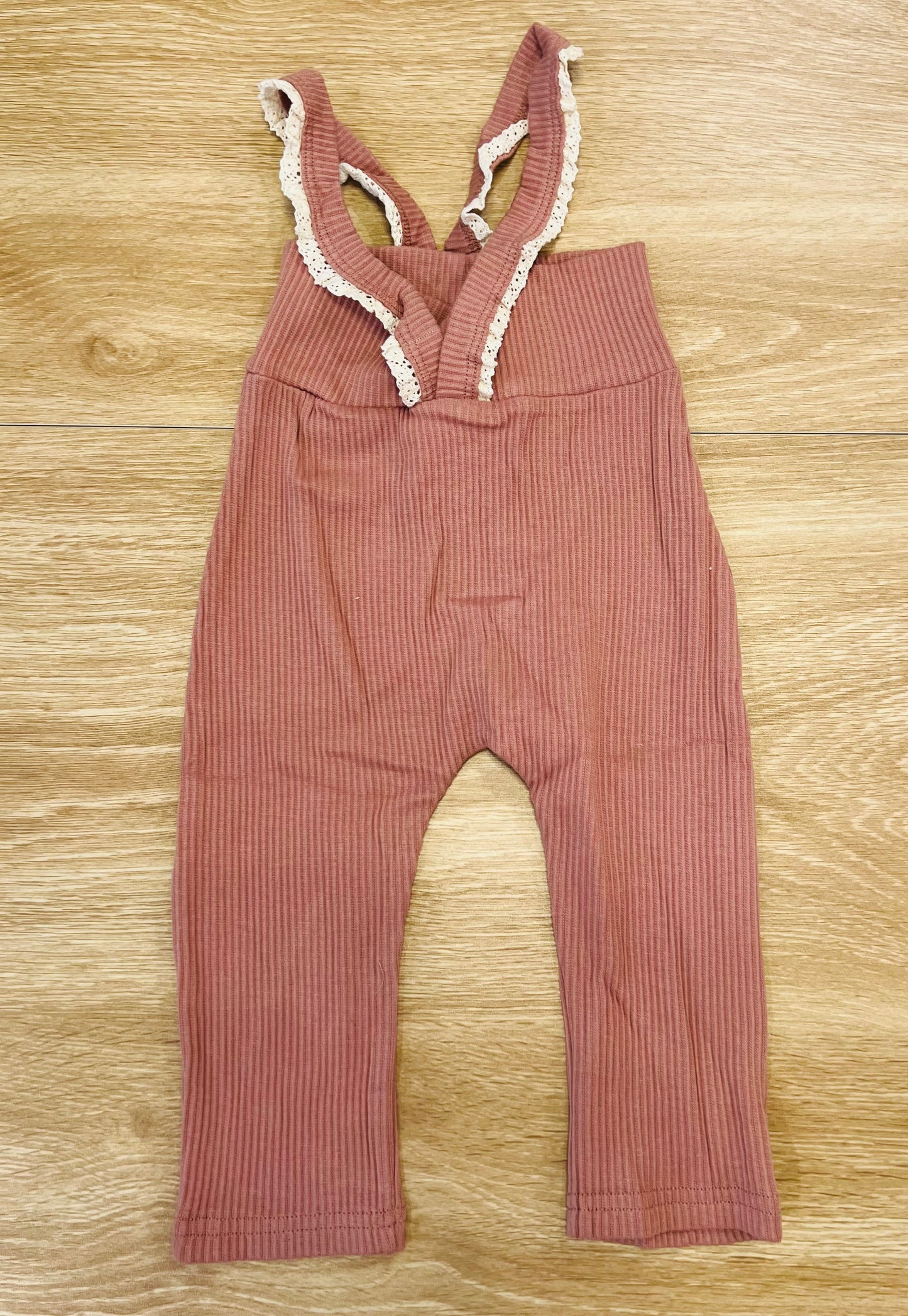 Pink ruffled suspenders